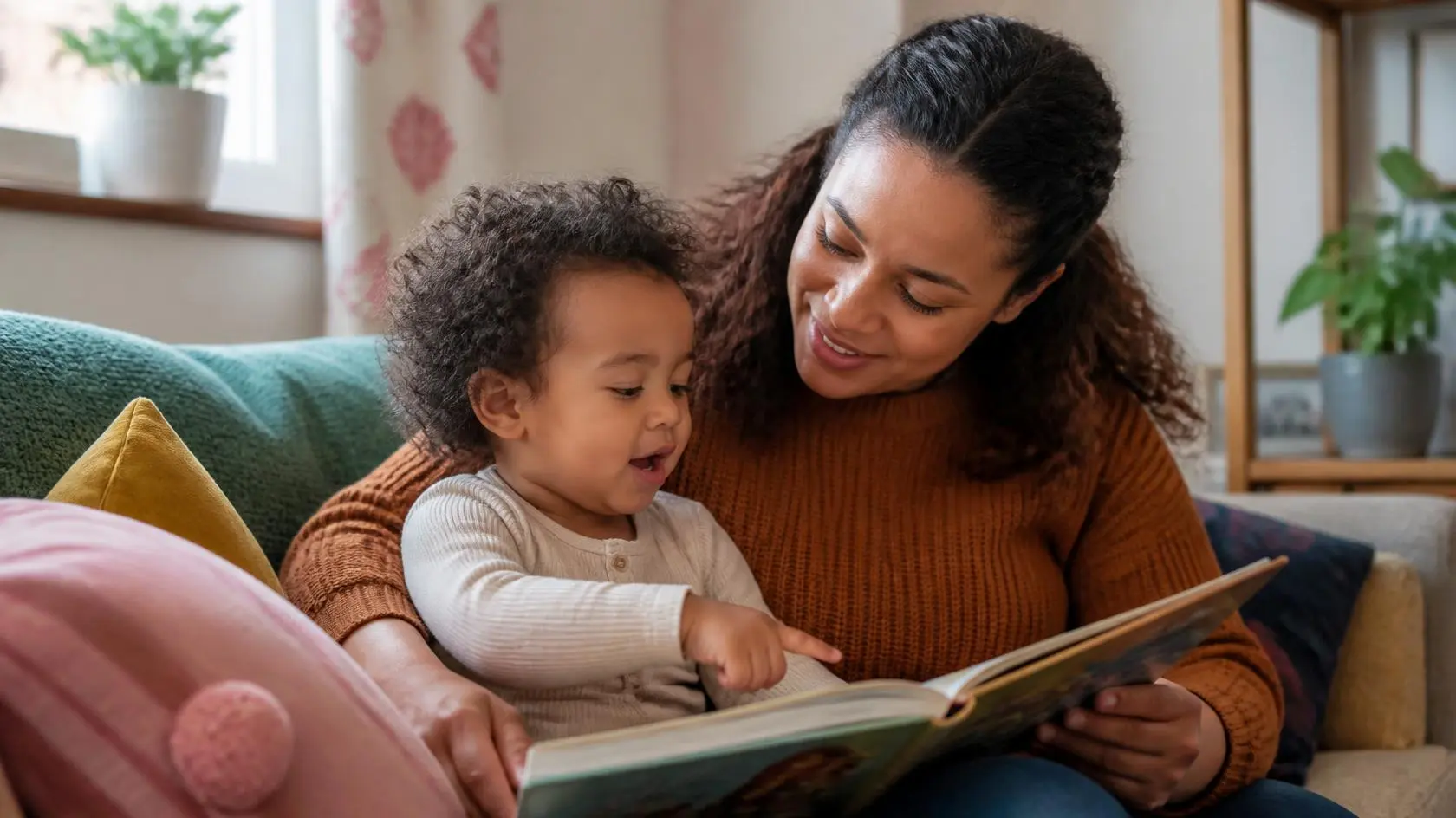Parent and toddler sharing a book, supporting speech and language milestones